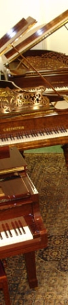 Grand pianos in the main showroom include Steinway, Bechstein, Bluthner, Yamaha, Kawai and Bosendorfer grand pianos
